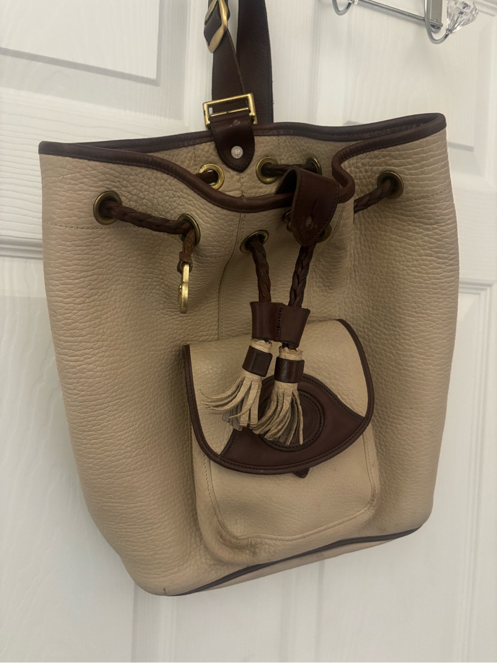 Dooney & Bourke Beige and Brown Leather Drawstring Bucket Backpack
